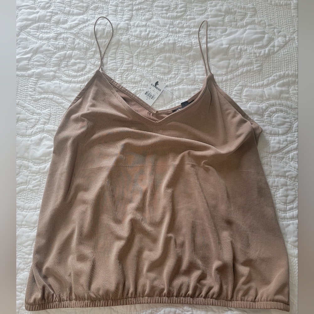Express tank top.  Elastic at the bottom to hug hips